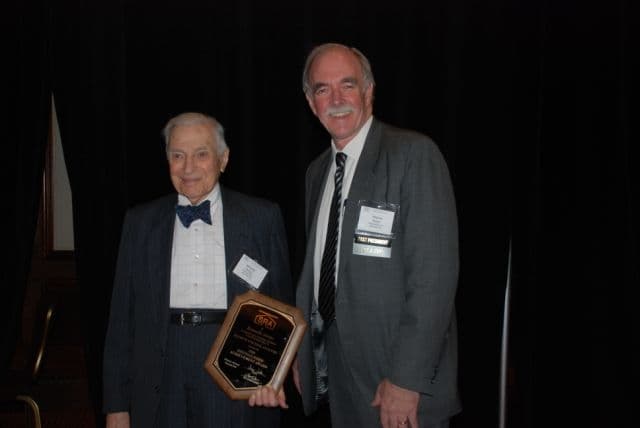Dr. North speaking at Belgian Senate